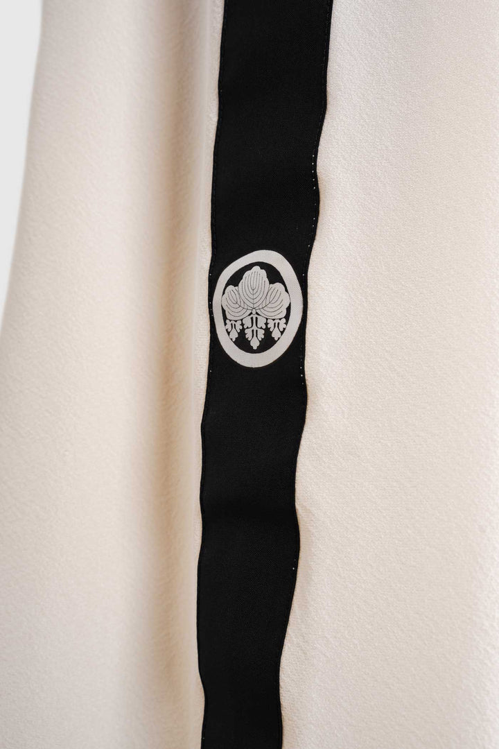 Contemporary Off-White with Black Side Details Silk Pants