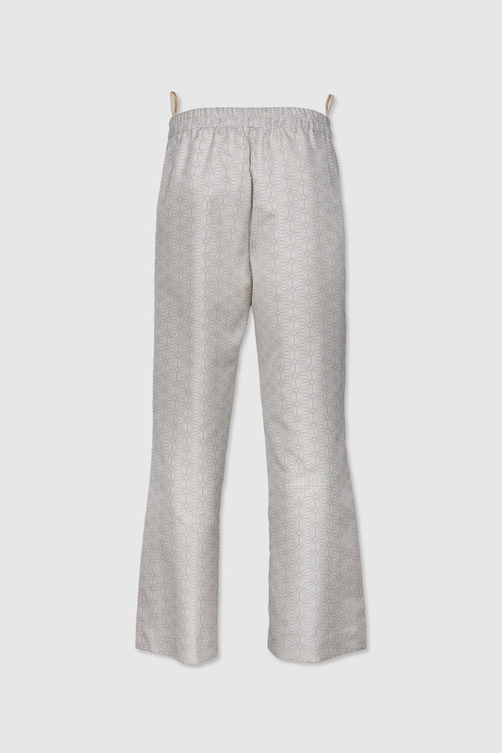 Straight-Cut Silk Pants with Subtle Geometric Design and Delicate Details
