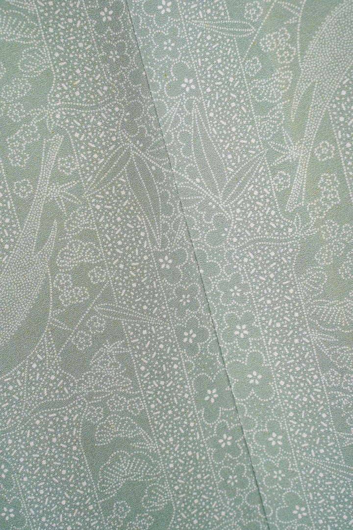 V-Neck Light Sage Green Patterned Silk Blouse with Off-White Lapel and Trimming